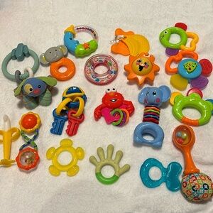 Variety of 20 different baby toys, rattles, tethers and stimulation for baby